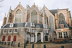 Low angle shot of the famous Oude Church in Amsterdam, Netherlands