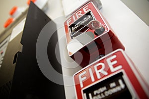 Low angle shot of fire alarm switch in factory