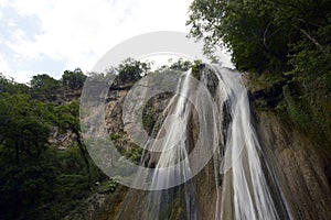 Low angle shot of the Horse Tail waterfall located in Nuevo Leon, Mexico photo