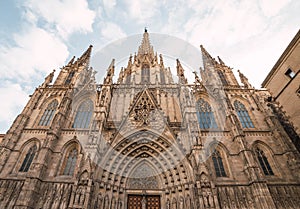 Low angle shot of the magnificent Cathedral of Barcelona located in Spain captured on a sunny day