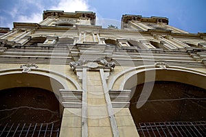 Low angle shot of an old clock tower in Colombia, Barranquilla architecture
