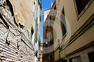 Low angle shot of old and damaged buildings