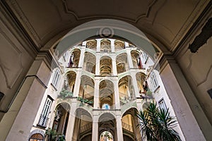 Low angle shot of Palazzo dello Spagnolo in Rione Sanita, Naples, Italy photo