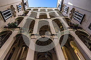 Low angle shot of Palazzo dello Spagnolo in Rione Sanita, Naples, Italy photo