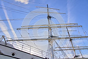Low-angle shot of a sailing ship - the large mast of an old sailing ship.