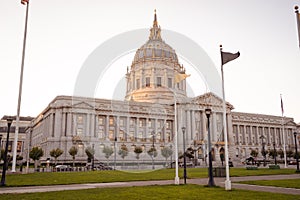 Low-angle shot of the San Francisco city hall against the bright white sky during the daytime