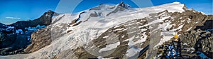 Low angle shot of a snowy mountainous scenery under the clear sky in Grossvenediger, Austria