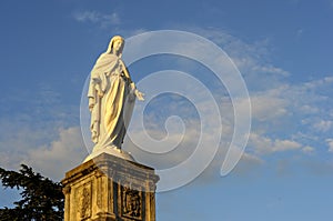 Low angle shot of a statue in France in the summer dawn at the Park Colline Saint Europe photo