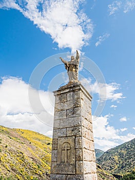 Low angle shot of the statue of Jesus in Viniegra of Abajo, La Rioja, Spain photo