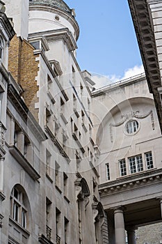 Low angle shot of a stone facade of an old Victorian building in London, England, UK