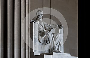 Low-angle shot of the stone Statue of Abraham Lincoln at Lincoln Memorial, Washington DC