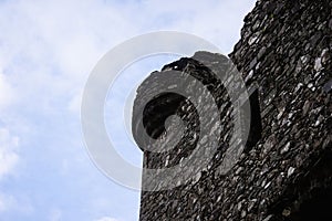 Low-angle shot of a stone wall of the Kilchurn Castle in Argyll and Bute, Scotland