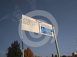 Low angle shot of a street sign under the blue sky captured in Georgia