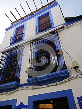 Low angle shot of a three-storey building in CÃÂ³rdoba, Spain photo