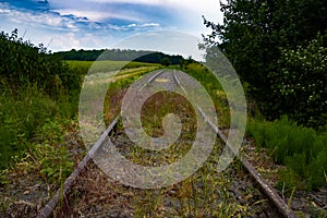 Low angle view of abandoned railroad tracks
