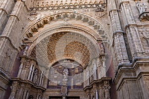 Low angle view of beautiful gothic style La Seu cathedral entrance with design