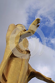 Low angle view of buddha statue in Nong Bua Lamphu, Thailand.