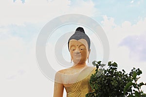 Low angle view of buddha statue in Nong Bua Lamphu, Thailand.