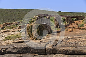 LOW ANGLE VIEW OF CALCIFIED WATER WHEEL photo