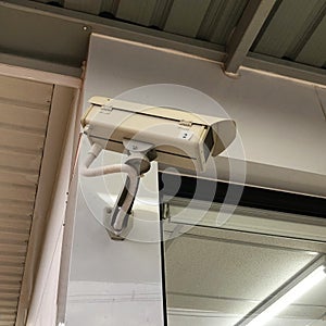 Low angle view of cctv on wall