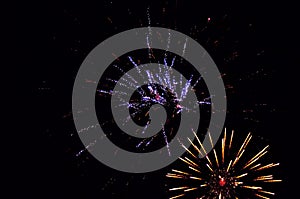 Low angle view of colorful fireworks in the sky during the night - a cool picture for backgrounds