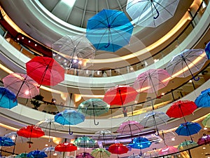 Low Angle View of Colorful Umbrellas Hanging in Rows