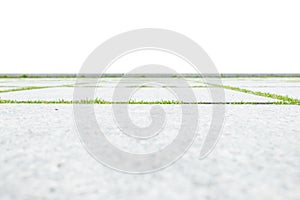 low angle view of concrete floor with green grass isolated on white background
