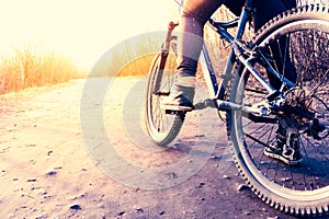 Low angle view of cyclist riding mountain bike