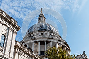 Low angle view of the Dome of St Paul Cathedral in London against blue sky