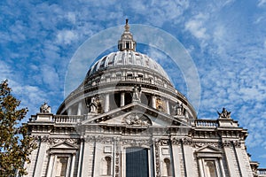 Low angle view of the Dome of St Paul Cathedral in London against blue sky