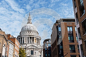 Low angle view of the Dome of St Paul Cathedral in London against blue sky