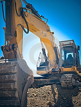 Low angle view of excavator at construction site