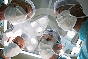 Low Angle View Of Four Surgeons