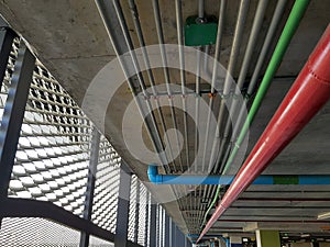 Low Angle View of Group of Pipes on Ceiling