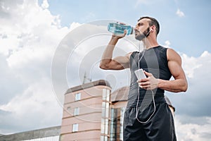 low angle view of handsome sportsman