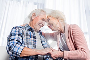 low angle view of happy senior couple looking at each other