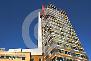 Low angle view of high multistorey office building photo