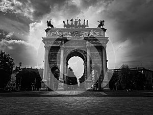 Low angle view of historical building Arch of Peace of Gate Sempione an ancient entrance of the city of Milan in Italy.