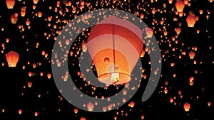 Low angle view of illuminated paper lantern against sky at night. lanterns