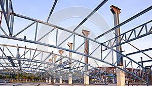 Low angle view of metal roof structure on the ground for install on top of building structure in construction site