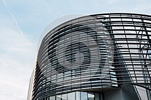 Low angle view of modern building against sky background