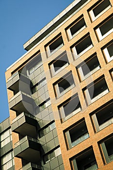 Low angle view of a modern red brick building