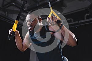 low angle view of muscular african american sportsman