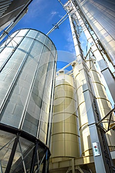 Low angle view of new grain silo in metal