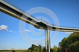 Low angle view of New Pedestrian Bridge (also called Klitschko Bridge) against blue sky