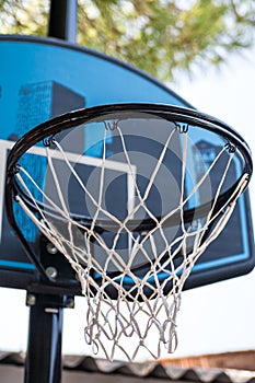 Low angle view on outdoor basketball hoop