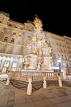 Low angle view of Pestsaule against building at Graben street in Vienna, Austria