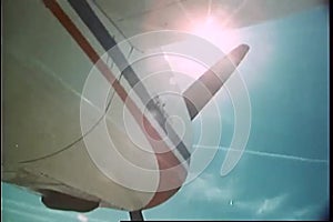 Low angle view of a private aircraft with propeller spinning