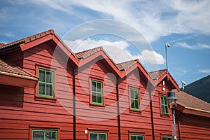 low angle view of red wooden houses in Flam village Aurlandsfjord