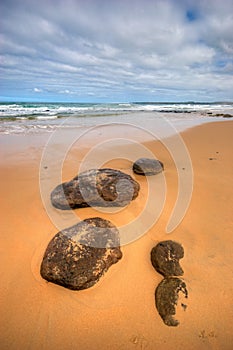 Low angle view of rocks on beach at Phillip Island photo